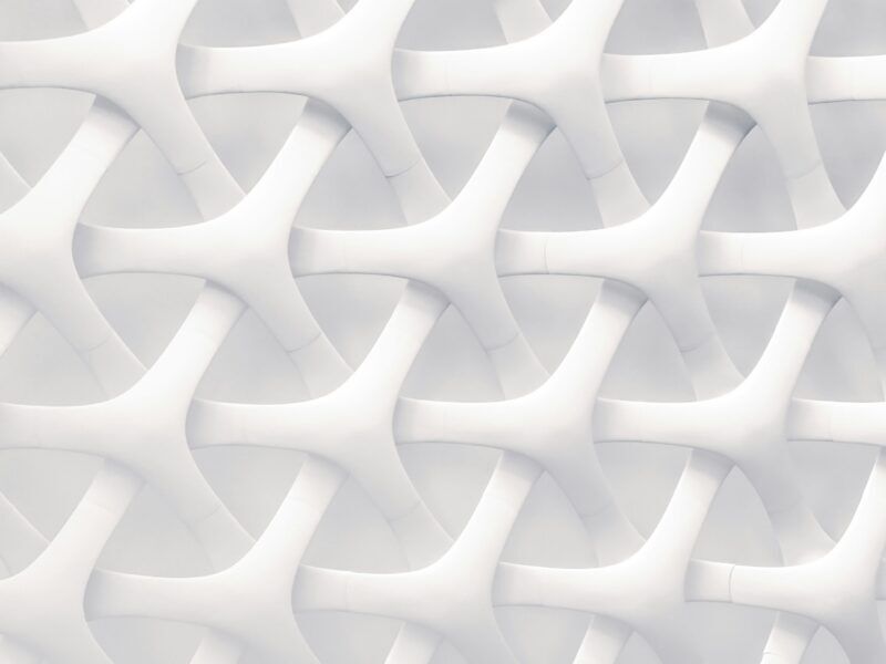 Abstract interwoven white geometric pattern representing complexity and Christian counselling formation